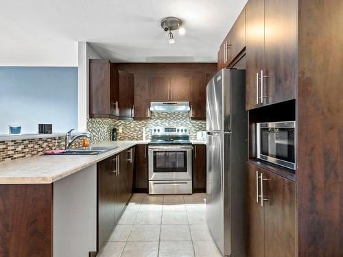 Cuisine - 3-5865 Boul. Chevrier, Brossard, QC - Indoor Photo Showing Kitchen With Double Sink With Upgraded Kitchen