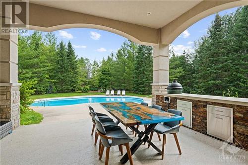 5800 Queenscourt Crescent, Ottawa, ON - Outdoor With In Ground Pool With Exterior
