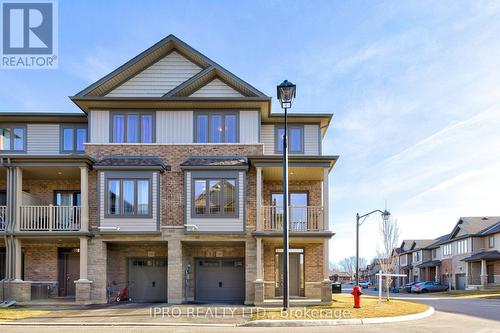 #149 -77 Diana Ave, Brantford, ON - Outdoor With Balcony With Facade