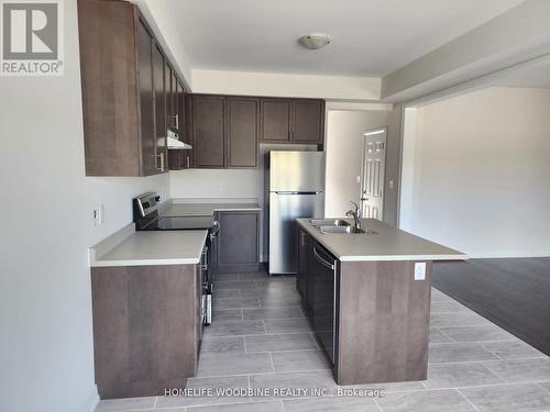 62 Nicort Road, Wasaga Beach, ON - Indoor Photo Showing Kitchen With Double Sink