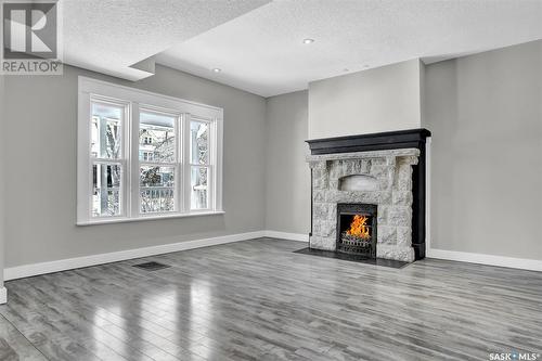 2059 Elphinstone Street, Regina, SK - Indoor Photo Showing Living Room With Fireplace