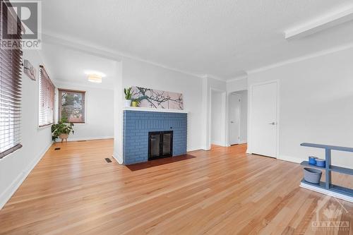 14 Steel Street, Ottawa, ON - Indoor Photo Showing Other Room With Fireplace