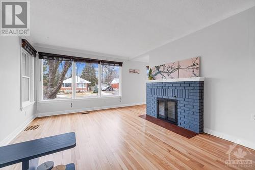 14 Steel Street, Ottawa, ON - Indoor Photo Showing Living Room With Fireplace