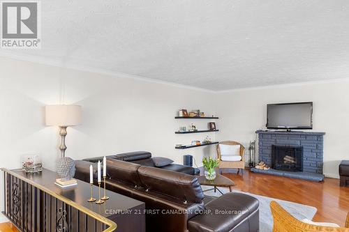 688 Westmount Hills Drive E, London, ON - Indoor Photo Showing Living Room With Fireplace
