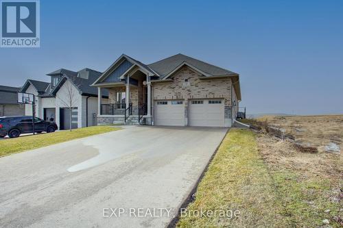 138 Ridgeview Dr, Mapleton, ON - Outdoor With Facade