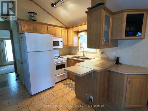 14 Pioneer Dr, Otonabee-South Monaghan, ON - Indoor Photo Showing Kitchen With Double Sink