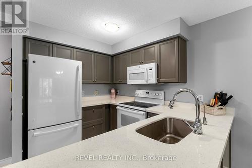 306 - 107 Bond Street, Orillia, ON - Indoor Photo Showing Kitchen With Double Sink