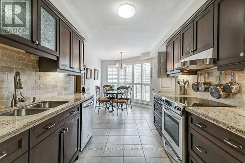 #301 -1700 The Collegeway, Mississauga, ON - Indoor Photo Showing Kitchen With Double Sink With Upgraded Kitchen