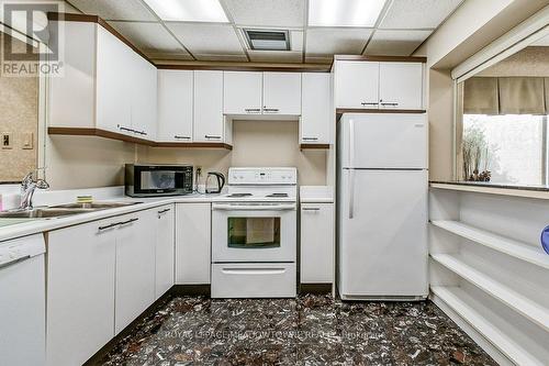 #301 -1700 The Collegeway, Mississauga, ON - Indoor Photo Showing Kitchen With Double Sink