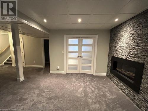 650 Rhine Fall Drive Unit# Lower Unit, Waterloo, ON - Indoor With Fireplace