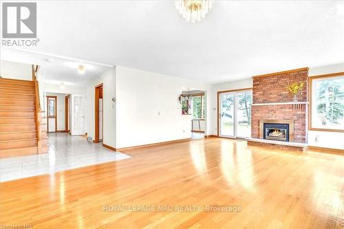 1138 Lakeshore Rd W, St. Catharines, ON - Indoor Photo Showing Other Room With Fireplace