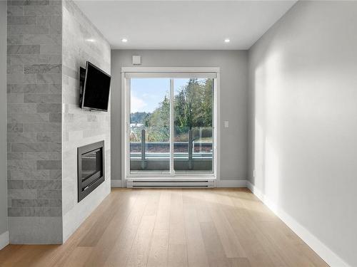 208-1820 Maple Ave South, Sooke, BC - Indoor With Fireplace