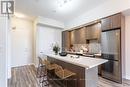 #107 -457 Plains Rd E, Burlington, ON  - Indoor Photo Showing Kitchen With Upgraded Kitchen 