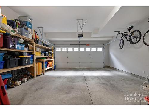 65 13670 62 Avenue, Surrey, BC - Indoor Photo Showing Garage