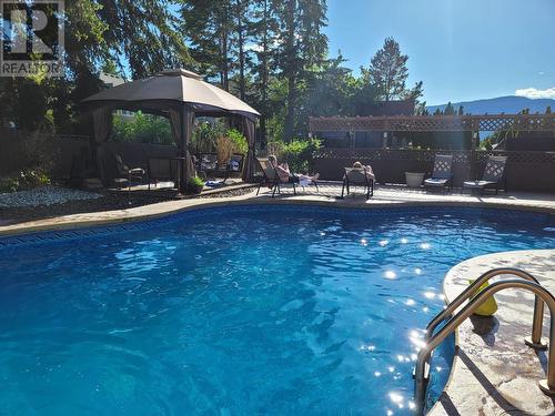 145 Magic Drive, Kelowna, BC - Outdoor With In Ground Pool With Backyard
