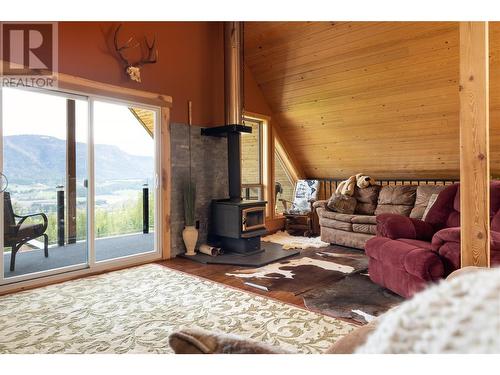 310 Grandview Bench Road, Grindrod, BC - Indoor Photo Showing Living Room With Fireplace