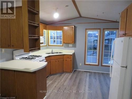 75 - 2189 Dundas Street E, London, ON - Indoor Photo Showing Kitchen With Double Sink