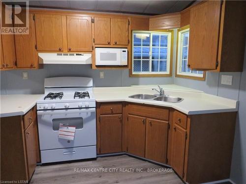 75 - 2189 Dundas Street E, London, ON - Indoor Photo Showing Kitchen With Double Sink
