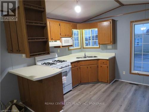 #75 -2189 Dundas St E, London, ON - Indoor Photo Showing Kitchen With Double Sink