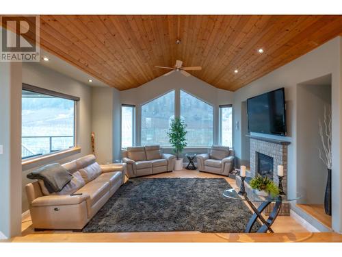 100 Fir Avenue, Kaleden, BC - Indoor Photo Showing Living Room With Fireplace