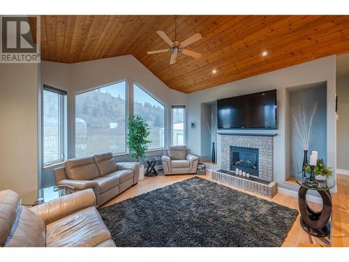 100 Fir Avenue, Kaleden, BC - Indoor Photo Showing Living Room With Fireplace