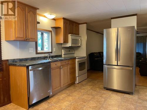 5304 41 Street, Fort Nelson, BC - Indoor Photo Showing Kitchen With Stainless Steel Kitchen With Double Sink