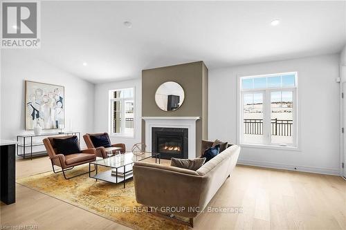 15 - 1080 Upperpoint Avenue, London, ON - Indoor Photo Showing Living Room With Fireplace