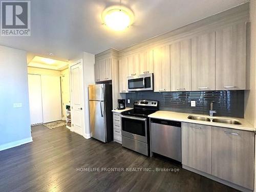 #710 -150 Main St W, Hamilton, ON - Indoor Photo Showing Kitchen With Double Sink