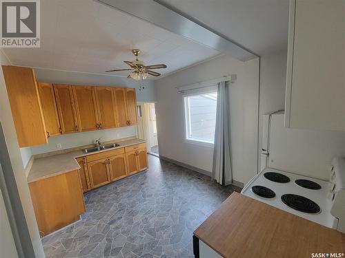 313 1St Street W, Wilkie, SK - Indoor Photo Showing Kitchen With Double Sink