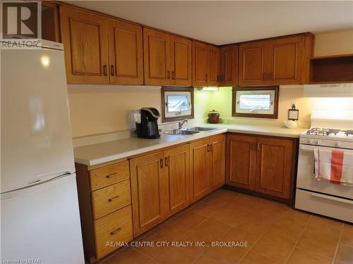 #121 -198 Springbank Dr, London, ON - Indoor Photo Showing Kitchen With Double Sink
