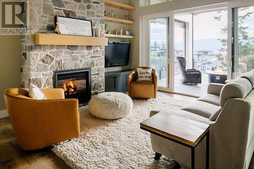 196 Summer Wood Drive, Kelowna, BC - Indoor Photo Showing Living Room With Fireplace