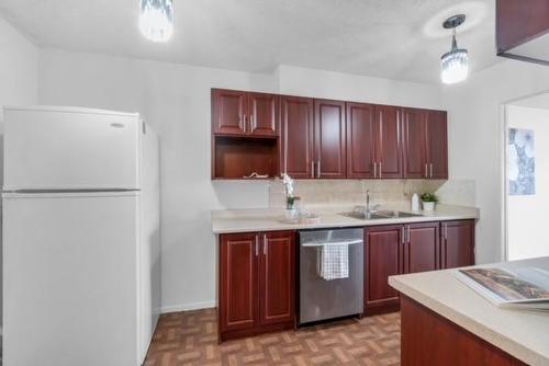 40 Panorama Court|Unit #1207, Toronto, ON - Indoor Photo Showing Kitchen With Double Sink