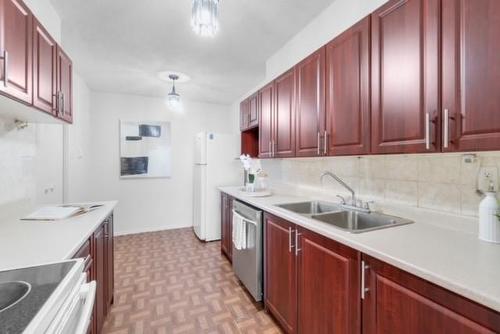 40 Panorama Court|Unit #1207, Toronto, ON - Indoor Photo Showing Kitchen With Double Sink