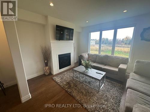 1021 Upperpoint Avenue, London, ON - Indoor Photo Showing Living Room With Fireplace