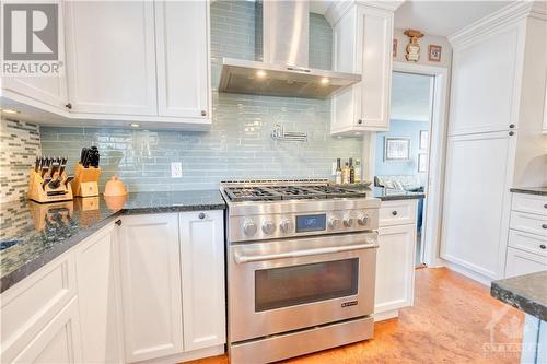 6 burner gas stove with pot filler faucet, spice racks and tray storage - 5 Huntmaster Lane, Ottawa, ON - Indoor Photo Showing Kitchen With Upgraded Kitchen