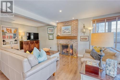 5 Huntmaster Lane, Ottawa, ON - Indoor Photo Showing Living Room With Fireplace