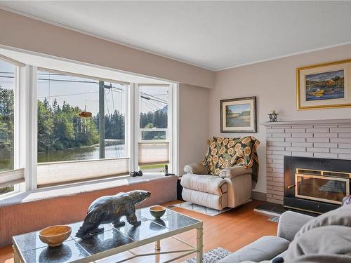 260 Kelsey Way, Sayward, BC - Indoor Photo Showing Living Room With Fireplace