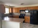 202 - 7129 Riverside Drive, Grand Forks, BC  - Indoor Photo Showing Kitchen 