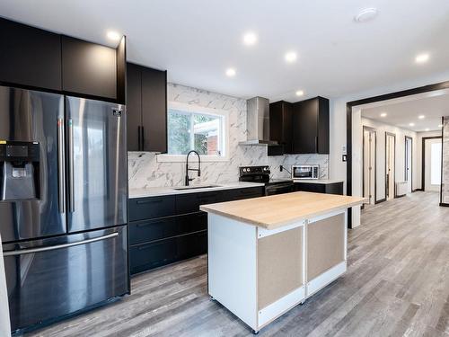 Cuisine - 4165 Rue Orchard, Longueuil (Saint-Hubert), QC - Indoor Photo Showing Kitchen With Upgraded Kitchen