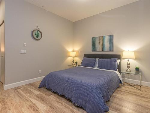 108-595 Pandora Ave, Victoria, BC - Indoor Photo Showing Bedroom