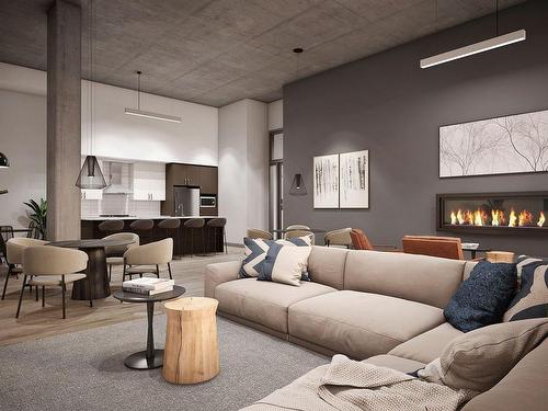 Common room - 411-175 Rue Jogue, Saint-Lambert-De-Lauzon, QC - Indoor Photo Showing Living Room With Fireplace