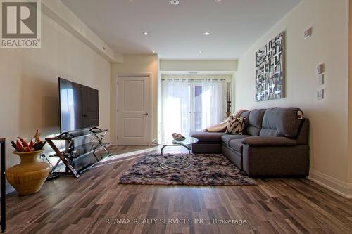 209 - 20 Koda Street, Barrie, ON - Indoor Photo Showing Living Room