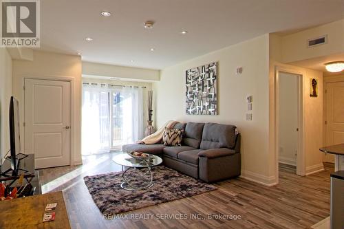 209 - 20 Koda Street, Barrie, ON - Indoor Photo Showing Living Room