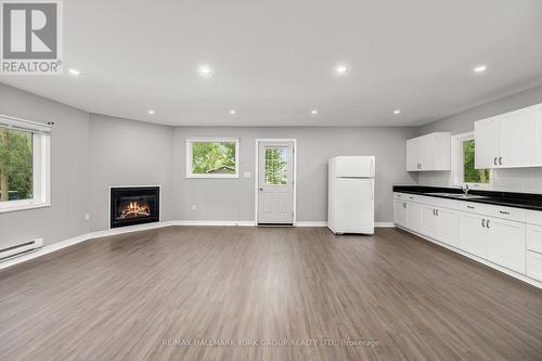 3554 John Street, Ramara, ON - Indoor With Fireplace
