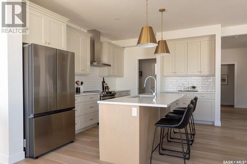 226 Flynn Bend, Saskatoon, SK - Indoor Photo Showing Kitchen With Upgraded Kitchen