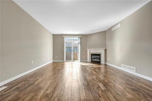4 Mckinnell Lane, Binbrook, ON - Indoor Photo Showing Living Room With Fireplace