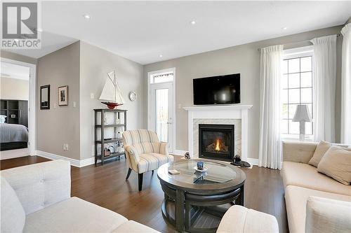 3232 Harvester Crescent, Kemptville, ON - Indoor Photo Showing Living Room With Fireplace