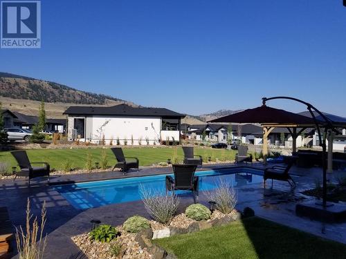 264 Rue Cheval Noir, Tobiano, BC - Outdoor With In Ground Pool With Backyard
