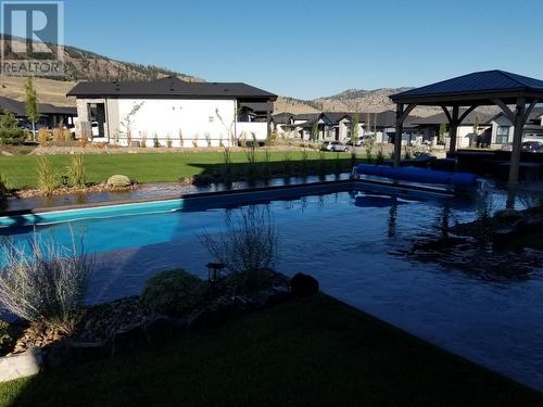 264 Rue Cheval Noir, Tobiano, BC - Outdoor With Body Of Water With Backyard