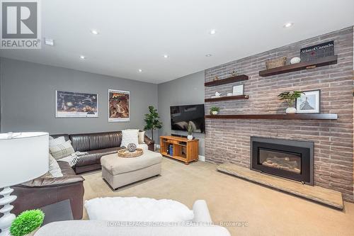 9 Heather Ave, Guelph, ON - Indoor Photo Showing Living Room With Fireplace